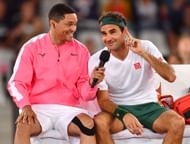 Trevor Noah (L) and Roger Federer during an exhibition event in Cape Town.